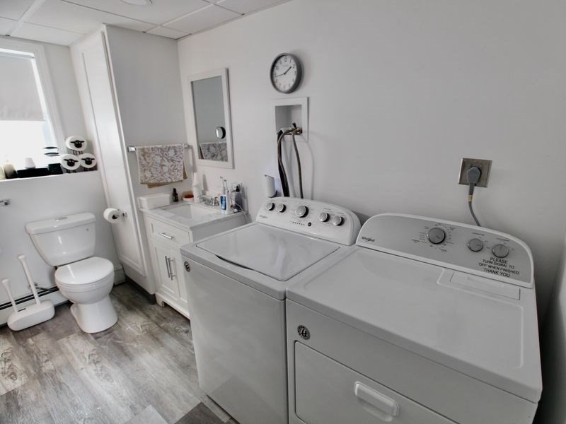54 Ann Street Raynham, MA 02767 - Photo 14 of 21 a bathroom with a sink toilet and mirror