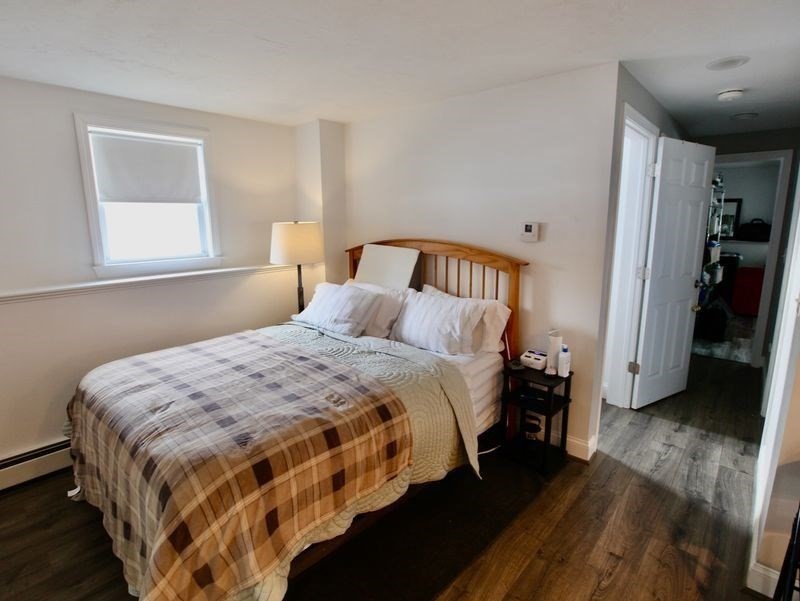 54 Ann Street Raynham, MA 02767 - Photo 15 of 21 a bedroom with a bed and a window