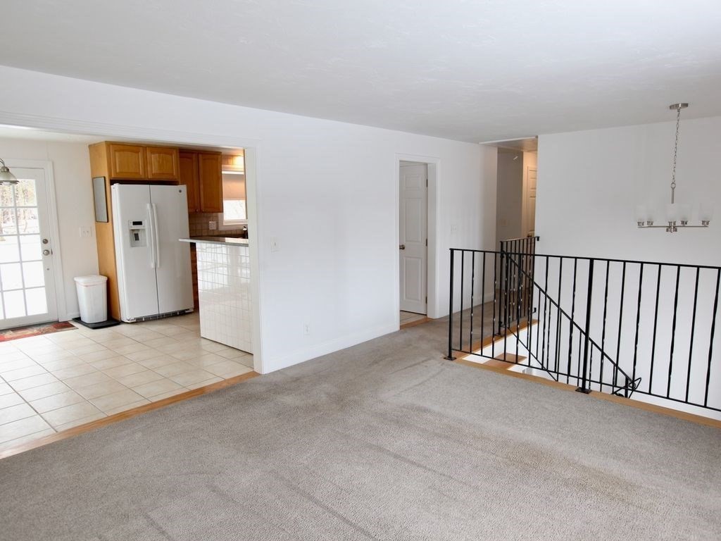 54 Ann Street Raynham, MA 02767 - Photo 7 of 21 a view of a room with a hallway