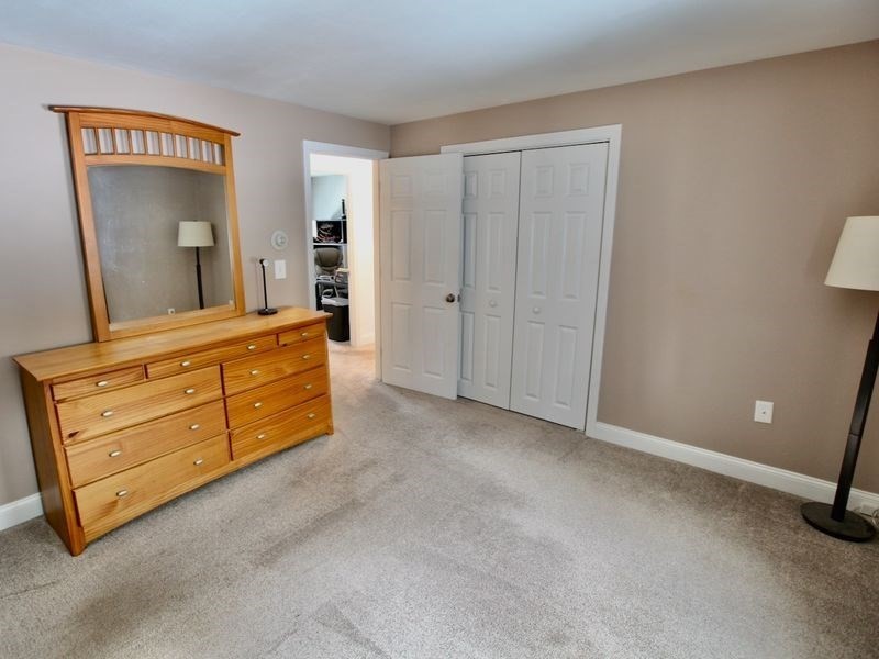 54 Ann Street Raynham, MA 02767 - Photo 10 of 21 a view of room with cabinet and mirror
