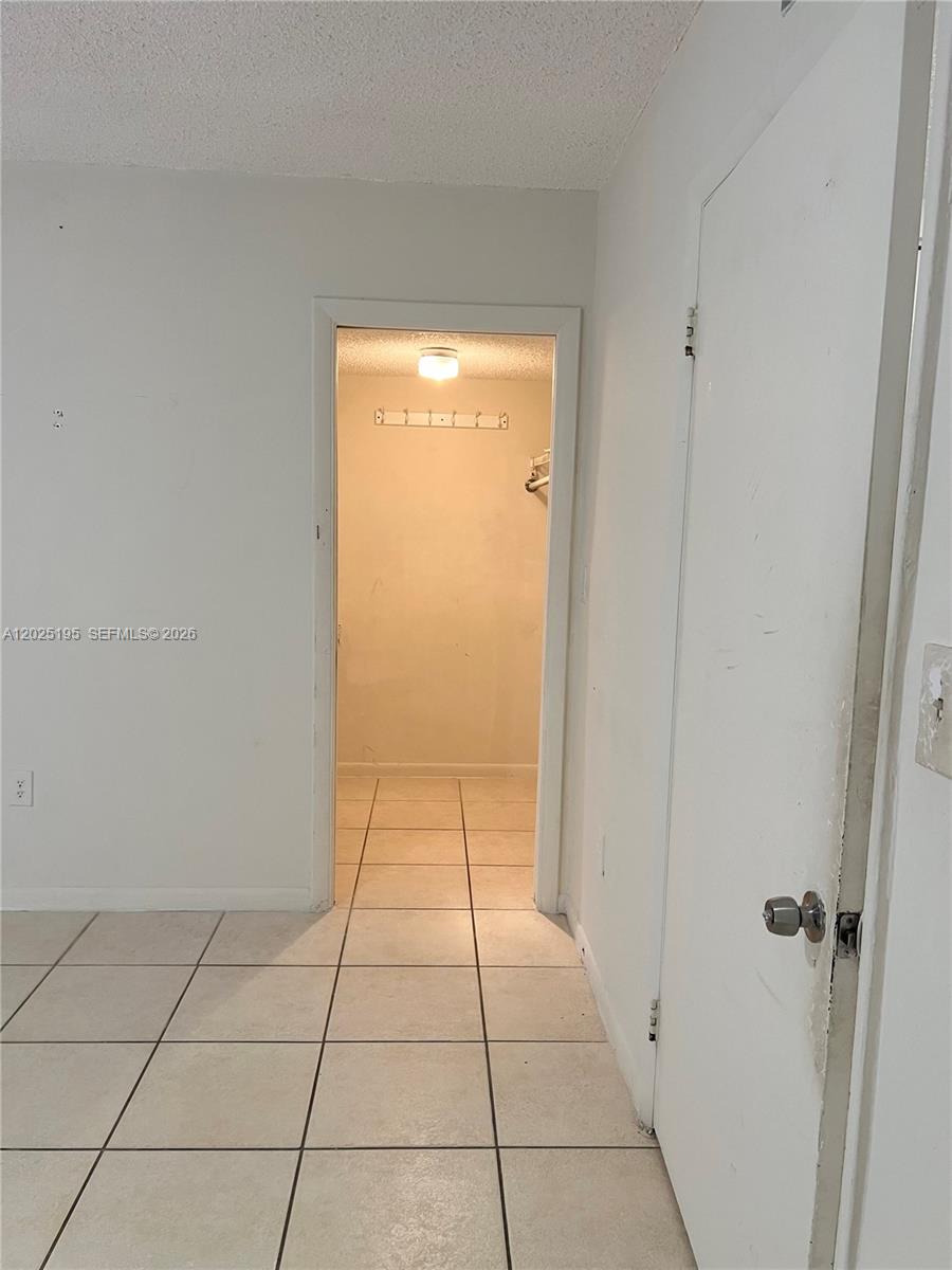 8400 Southwest 133rd Avenue Road, Unit 121 Miami, FL 33183 - Photo 34 of 43 a view of an empty room and window