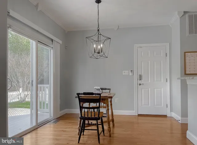 a view of kitchen with wooden floor