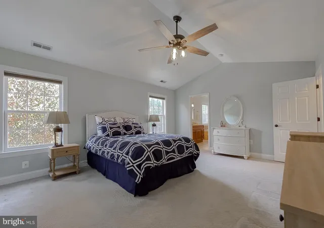 a bathroom with a bathtub and a sink