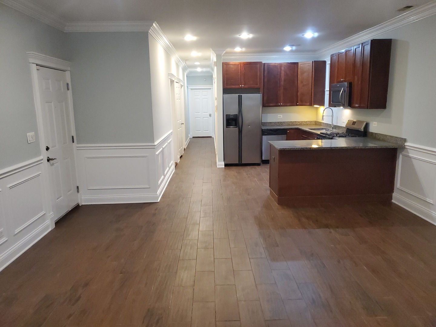 Undisclosed Address Chicago, IL 60645 - Photo 9 of 22 a view of kitchen with refrigerator sink and cabinets