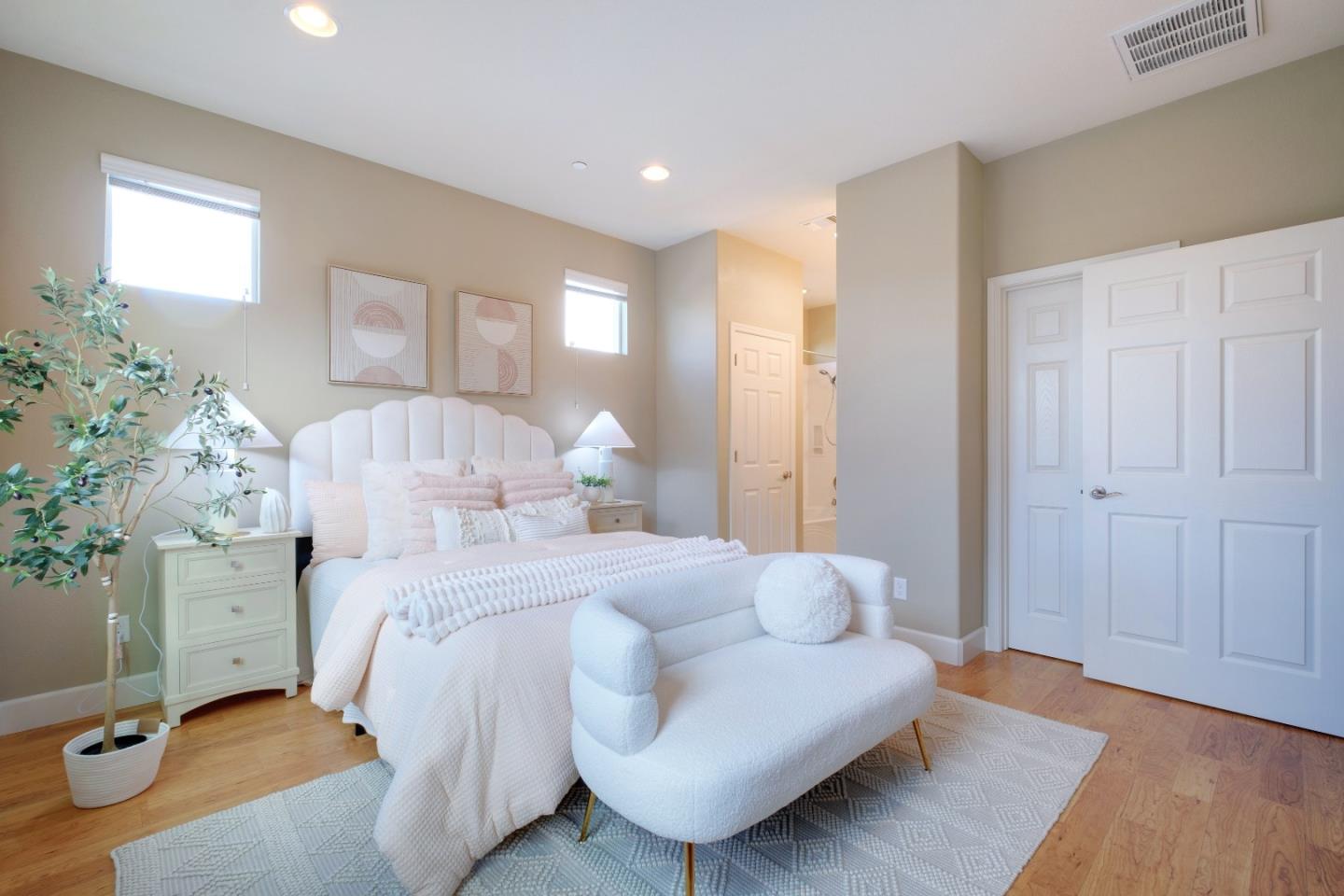 1059 Eagle Way San Jose, CA 95131 - Photo 19 of 56 a bedroom with a bed and wooden floor