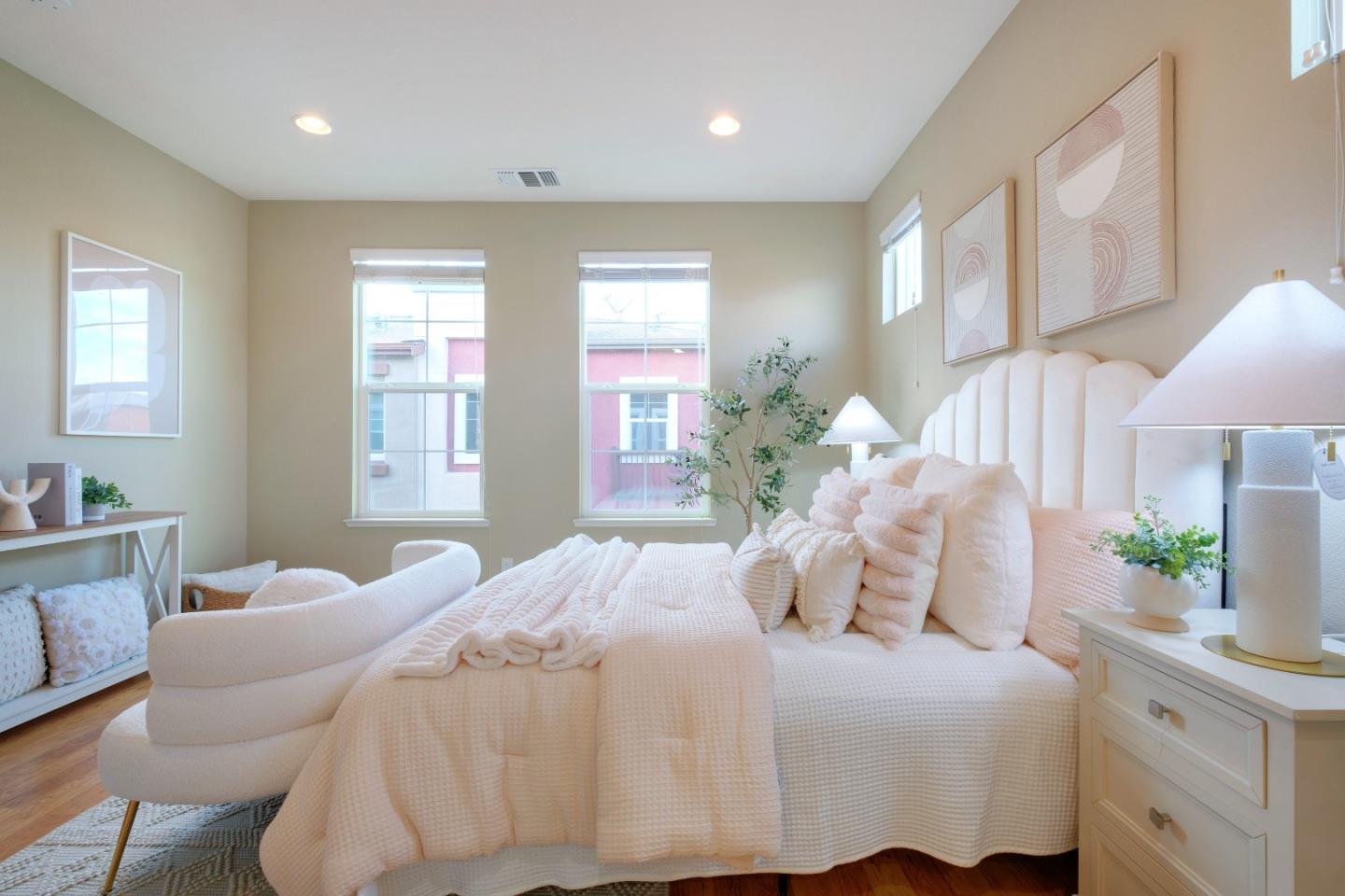 1059 Eagle Way San Jose, CA 95131 - Photo 20 of 56 a bedroom with a large bed and a window