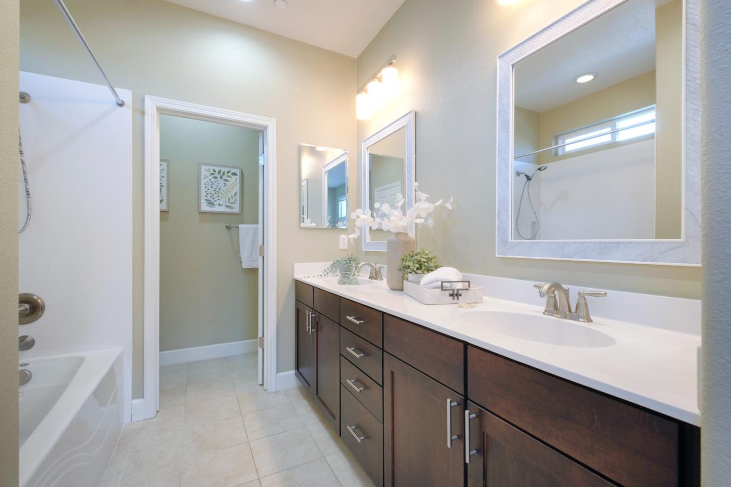 1059 Eagle Way San Jose, CA 95131 - Photo 23 of 56 a bathroom with a double vanity sink mirror and bathtub