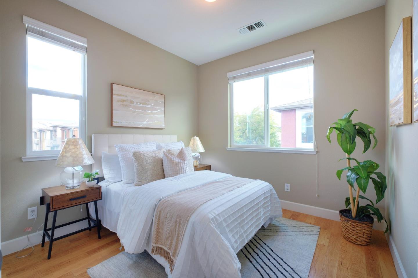 1059 Eagle Way San Jose, CA 95131 - Photo 28 of 56 a bedroom with a bed and a window