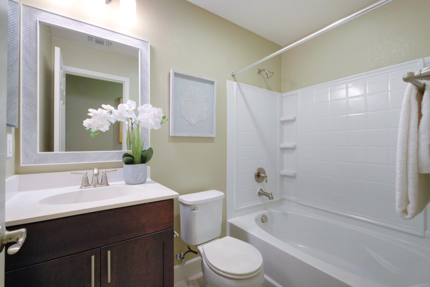 1059 Eagle Way San Jose, CA 95131 - Photo 34 of 56 a bathroom with a sink a toilet and shower