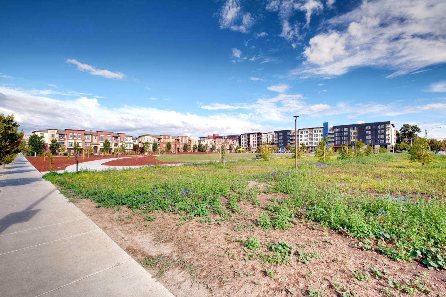 1059 Eagle Way San Jose, CA 95131 - Photo 44 of 56 a view of a lake with houses in the back