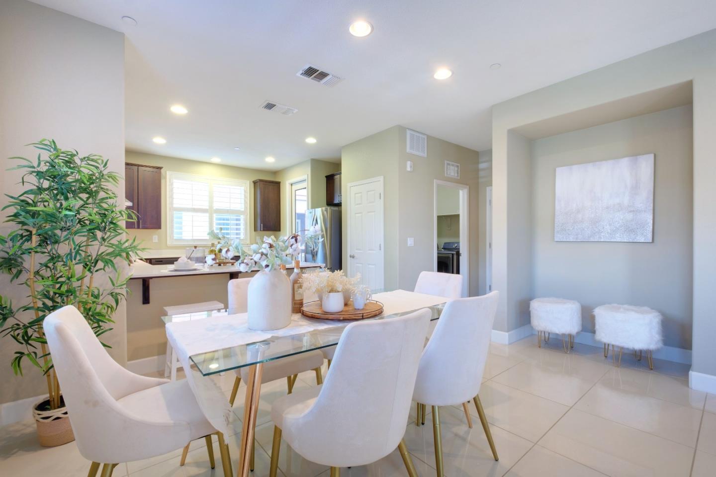 1059 Eagle Way San Jose, CA 95131 - Photo 9 of 56 a dining room with furniture and a large window