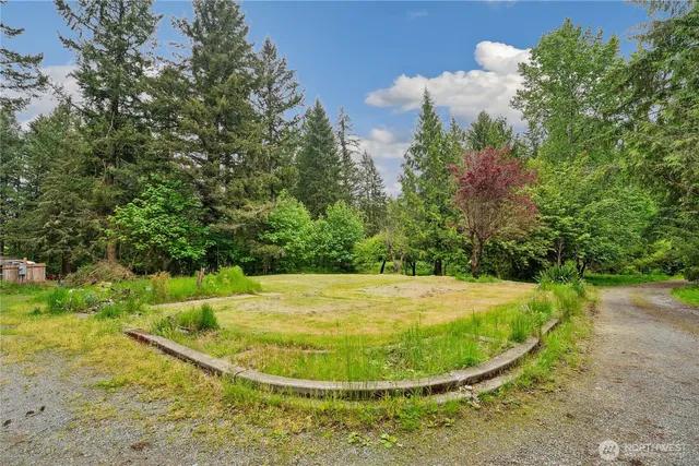 a view of a swimming pool in a yard