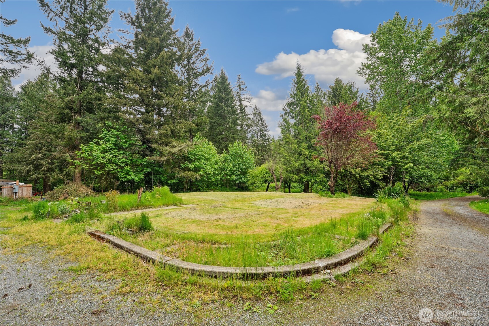 a view of a swimming pool in a yard