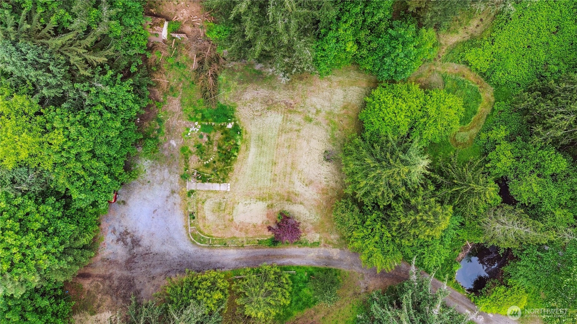 19106 255th St Court East Orting, WA 98360 - Photo 2 of 9 an aerial view of a house with a yard