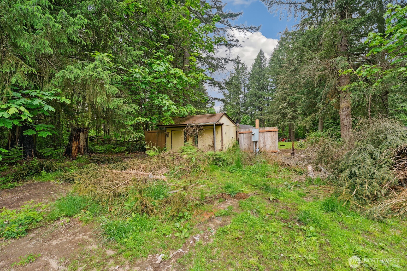 19106 255th St Court East Orting, WA 98360 - Photo 3 of 9 a view of a house with a yard
