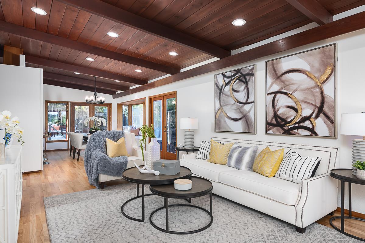 3217 Upper Lock Avenue Belmont, CA 94002 - Photo 2 of 59 a living room with furniture and wooden floor