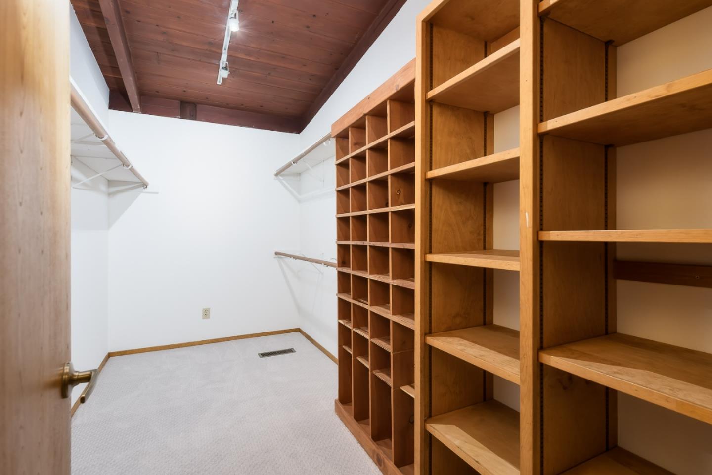 3217 Upper Lock Avenue Belmont, CA 94002 - Photo 22 of 59 a view of walk in closet with empty racks