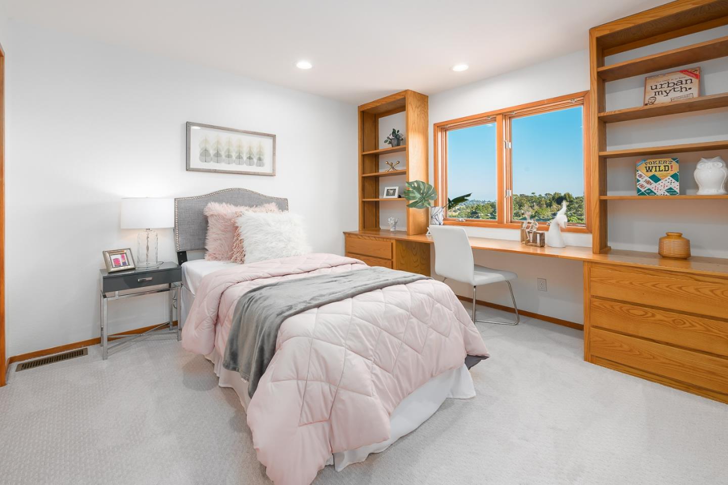 3217 Upper Lock Avenue Belmont, CA 94002 - Photo 23 of 59 a spacious bedroom with a bed and a large window