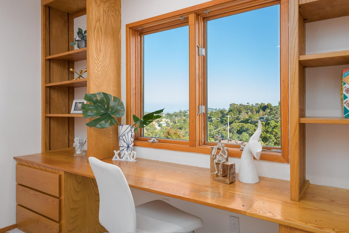3217 Upper Lock Avenue Belmont, CA 94002 - Photo 24 of 59 a dining room with a large window and couch