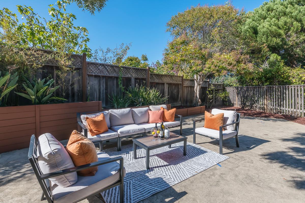 3217 Upper Lock Avenue Belmont, CA 94002 - Photo 34 of 59 a backyard of a house with outdoor seating