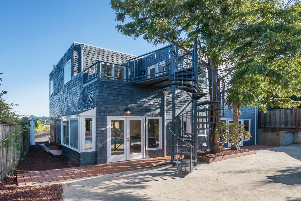 3217 Upper Lock Avenue Belmont, CA 94002 - Photo 37 of 59 a front view of a house with a tree