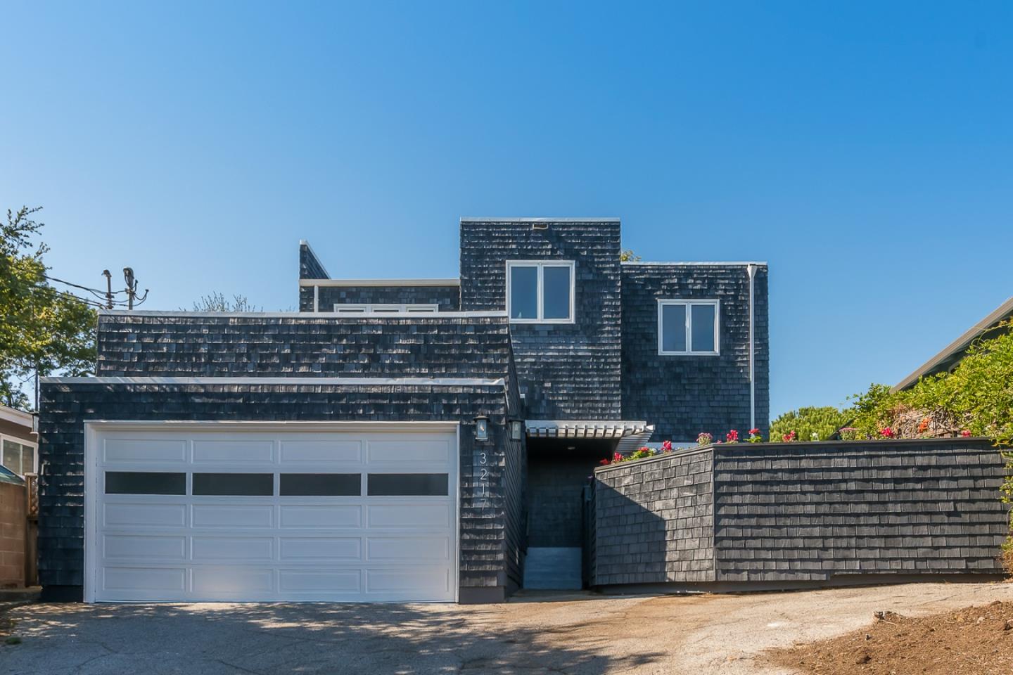 3217 Upper Lock Avenue Belmont, CA 94002 - Photo 38 of 59 a front view of a house with yard