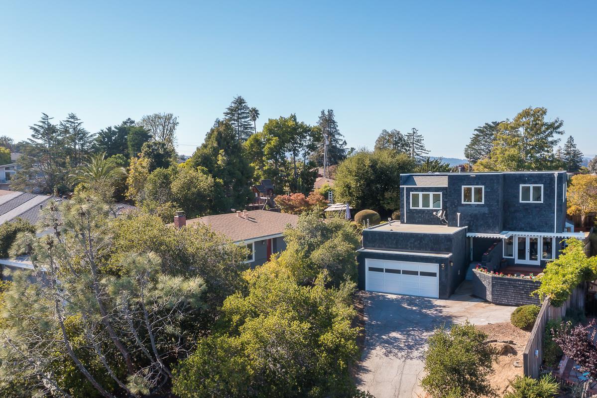 3217 Upper Lock Avenue Belmont, CA 94002 - Photo 42 of 59 a view of a house with a yard and sitting area