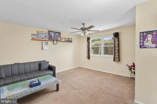 a living room with furniture and window