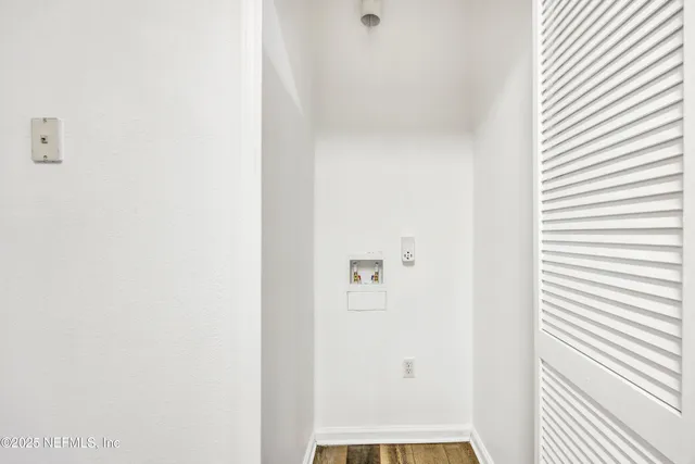 a kitchen with stainless steel appliances granite countertop a sink stove and microwave