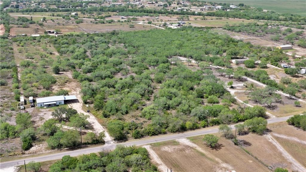 0 County Rd 3075 Orange Grove, TX 78372 - Photo 9 of 9 an aerial view of residential houses with outdoor space and trees