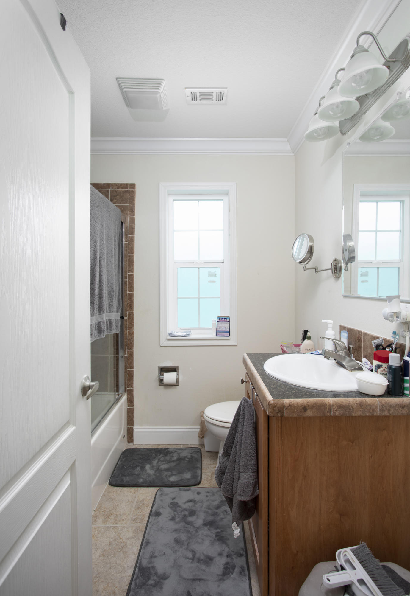 59 Palm Drive Key West, FL 33040 - Photo 12 of 14 a bathroom with a sink a toilet and shower