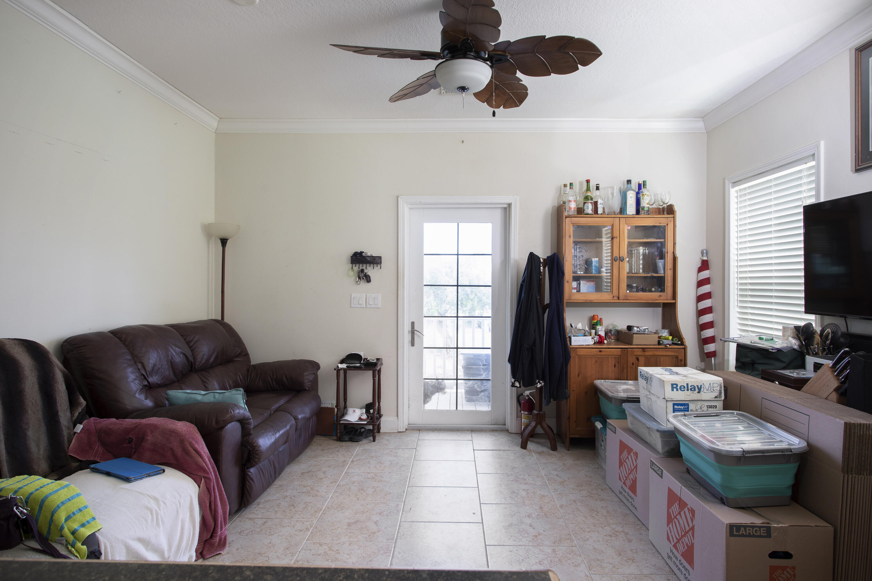 59 Palm Drive Key West, FL 33040 - Photo 5 of 14 a living room with furniture and a flat screen tv