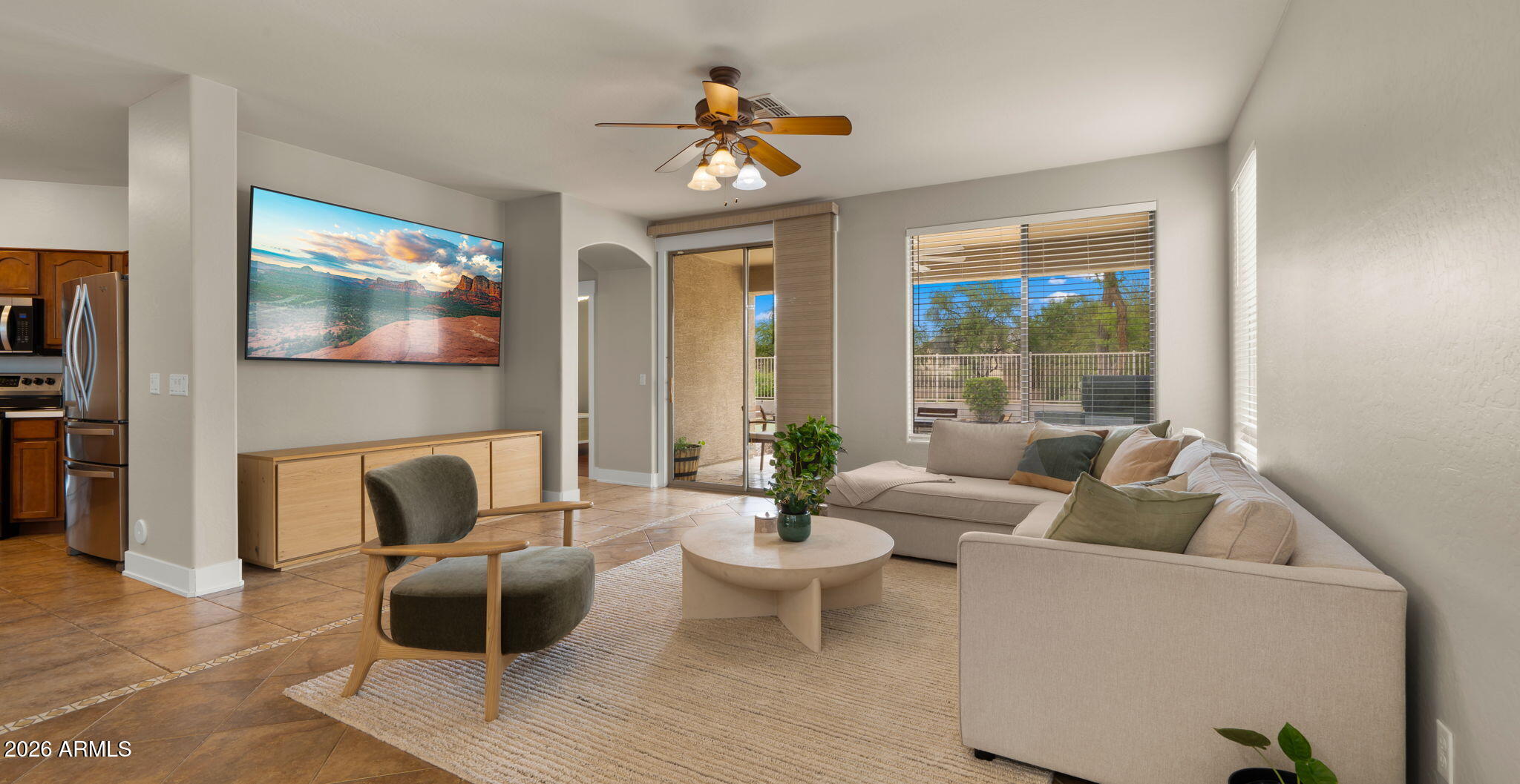 3344 East Hopkins Road Gilbert, AZ 85295 - Photo 11 of 32 a living room with furniture and a large window