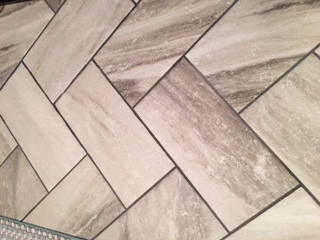 3977 Cross Plains Road Springfield, TN 37172 - Photo 12 of 16 Master bath updated in 2017 features herringbone tile flooring, separate vanity and bath area, large tiled shower.