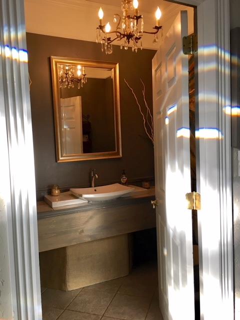 3977 Cross Plains Road Springfield, TN 37172 - Photo 8 of 16 Updated guest powder room on main level. (Chandelier will be switched out.)