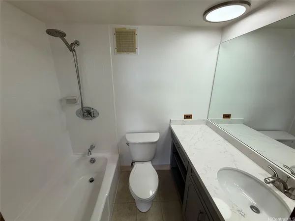 a bathroom with a sink and toilet