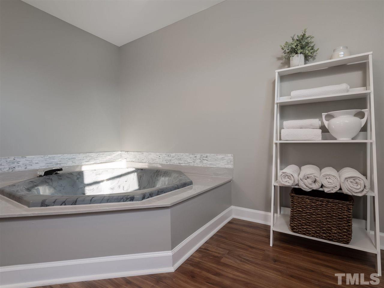 1825 Wire Road Bunnlevel, NC 28323 - Photo 30 of 30 Durable floors and spacious floor plan make this master bath the star of the show!