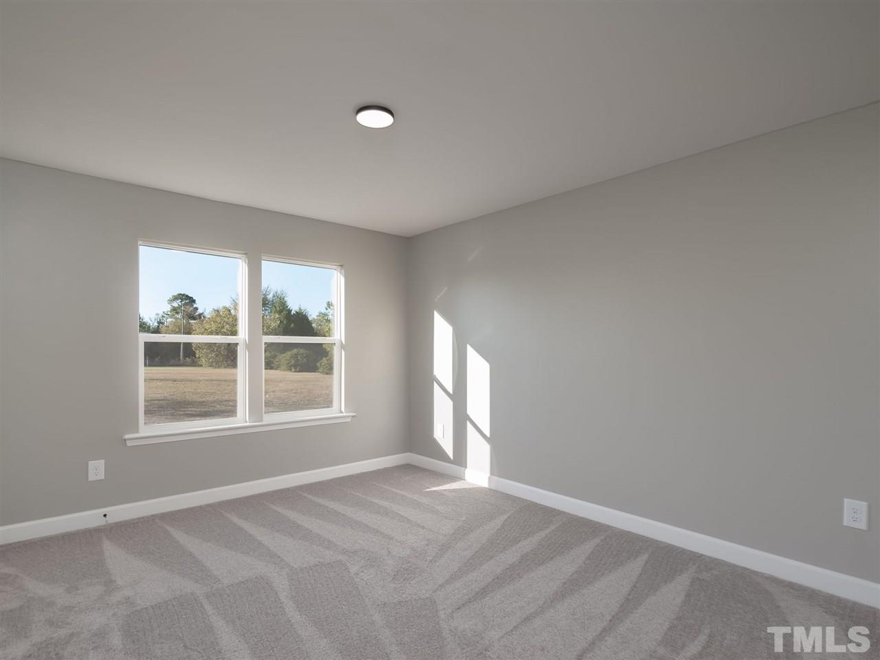 1825 Wire Road Bunnlevel, NC 28323 - Photo 20 of 30 Walk in closet and brand new carpet plus new paint!