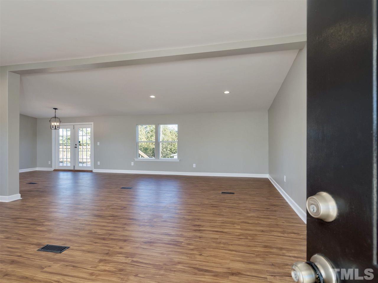 1825 Wire Road Bunnlevel, NC 28323 - Photo 7 of 30 Brand new high quality paint throughout the whole home sets the stage for your new living experience! Home comes equipped with state of the art security system!