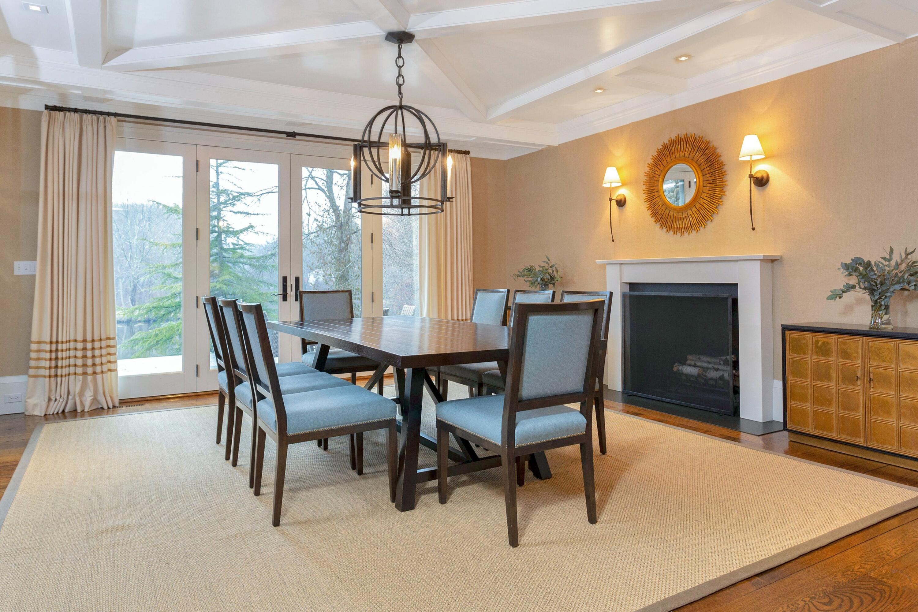 20 Driftway Lane Darien, CT 06820 - Photo 12 of 76 a view of a dining room with furniture window and outside view