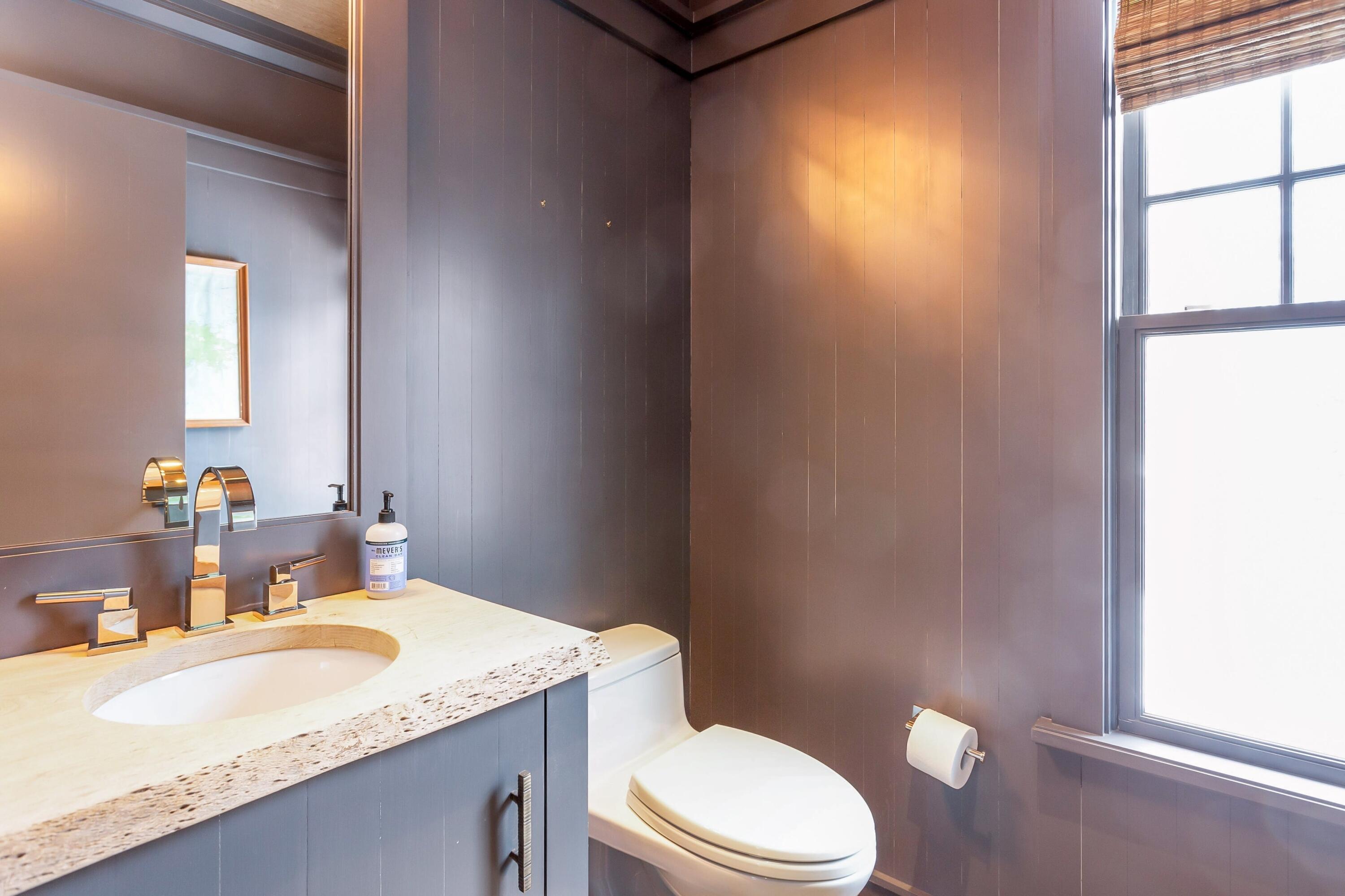 20 Driftway Lane Darien, CT 06820 - Photo 27 of 76 a bathroom with a granite countertop sink toilet and mirror