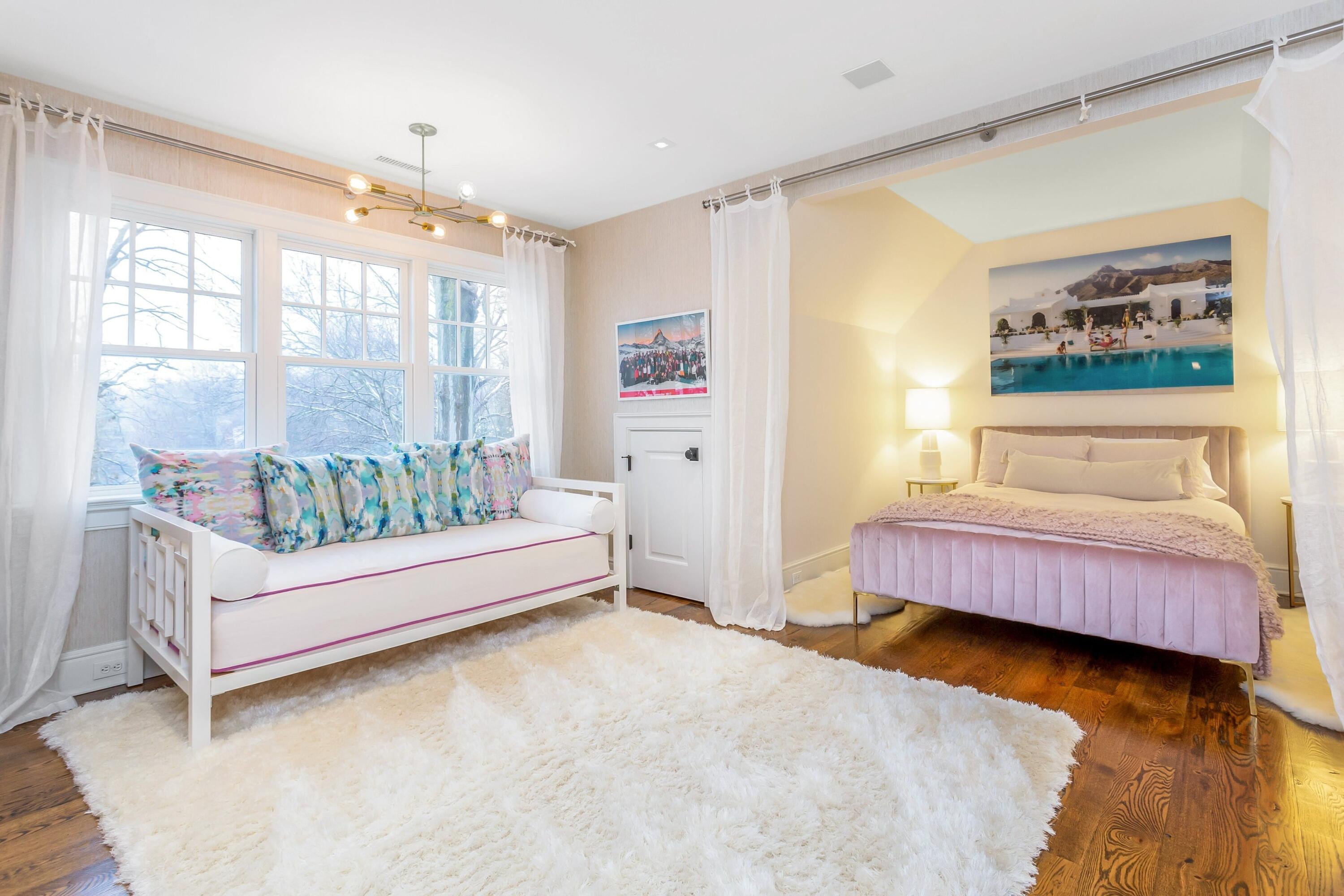 20 Driftway Lane Darien, CT 06820 - Photo 38 of 76 a spacious bedroom with a bed and a couch