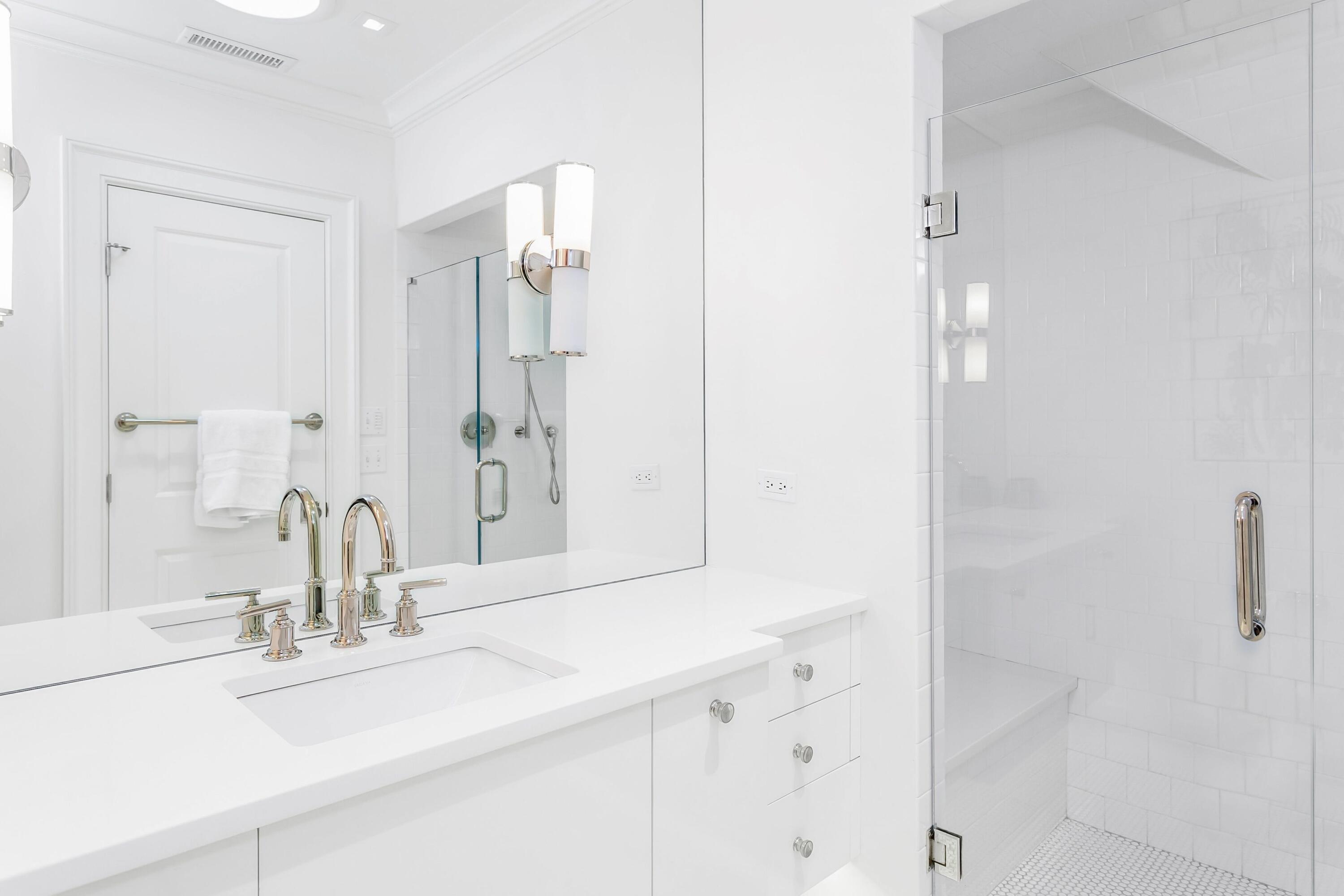 20 Driftway Lane Darien, CT 06820 - Photo 40 of 76 a bathroom with a sink and a mirror