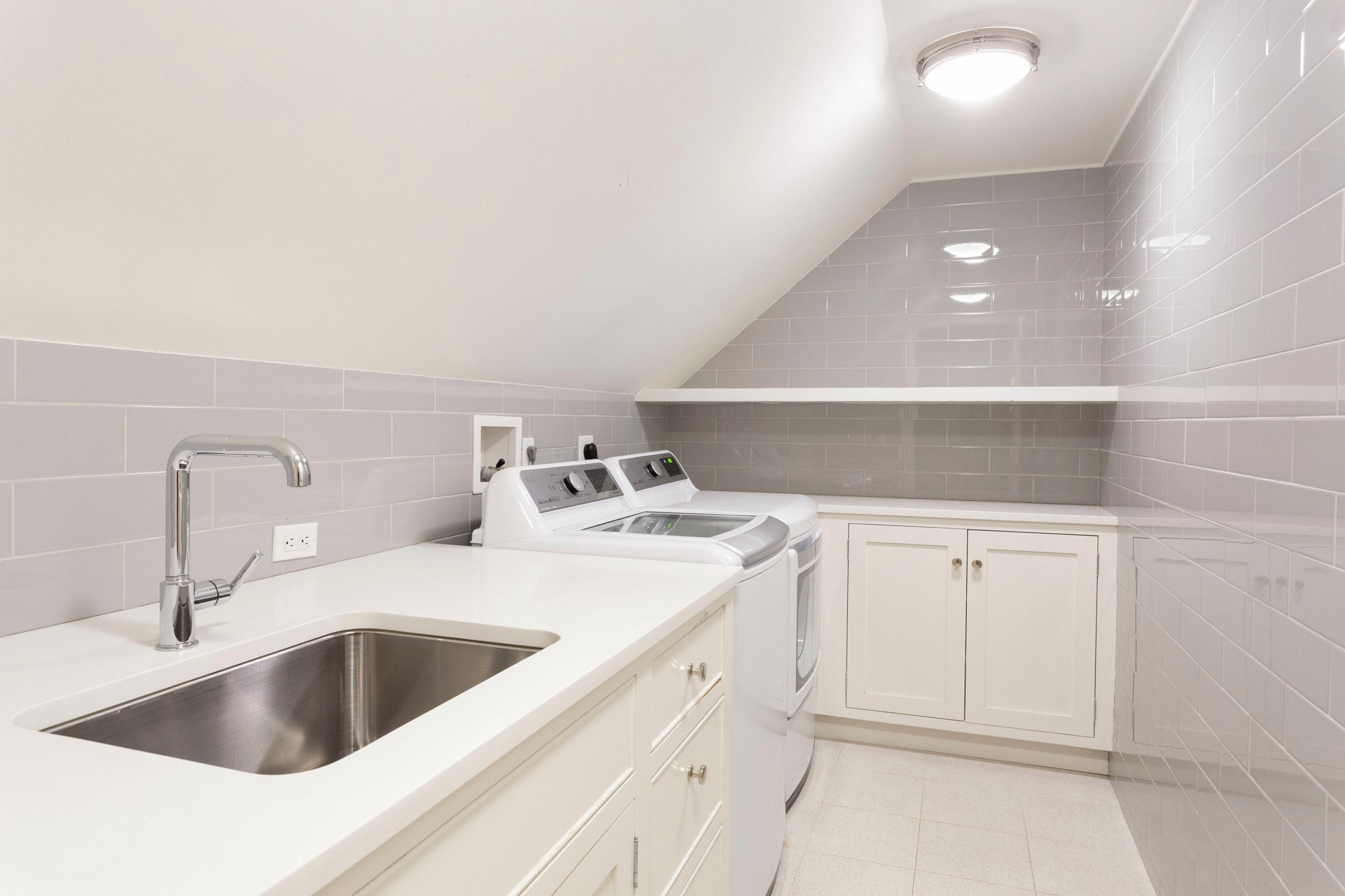 20 Driftway Lane Darien, CT 06820 - Photo 52 of 76 a kitchen with a sink and cabinets