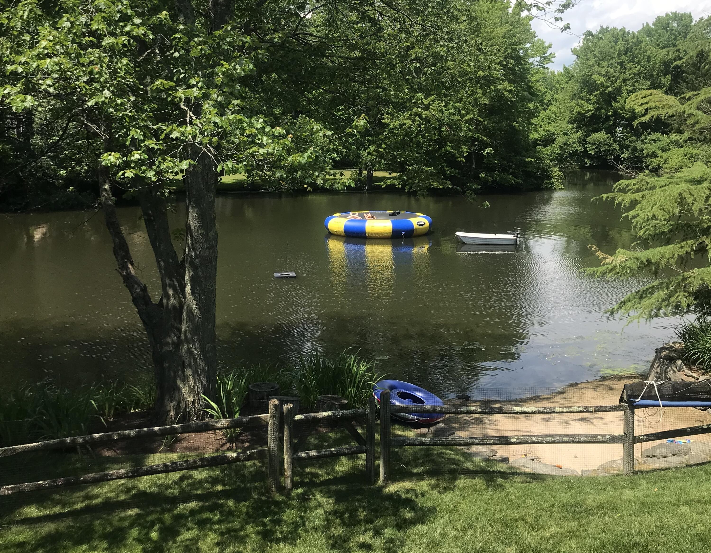 20 Driftway Lane Darien, CT 06820 - Photo 61 of 76 a view of a lake from a yard