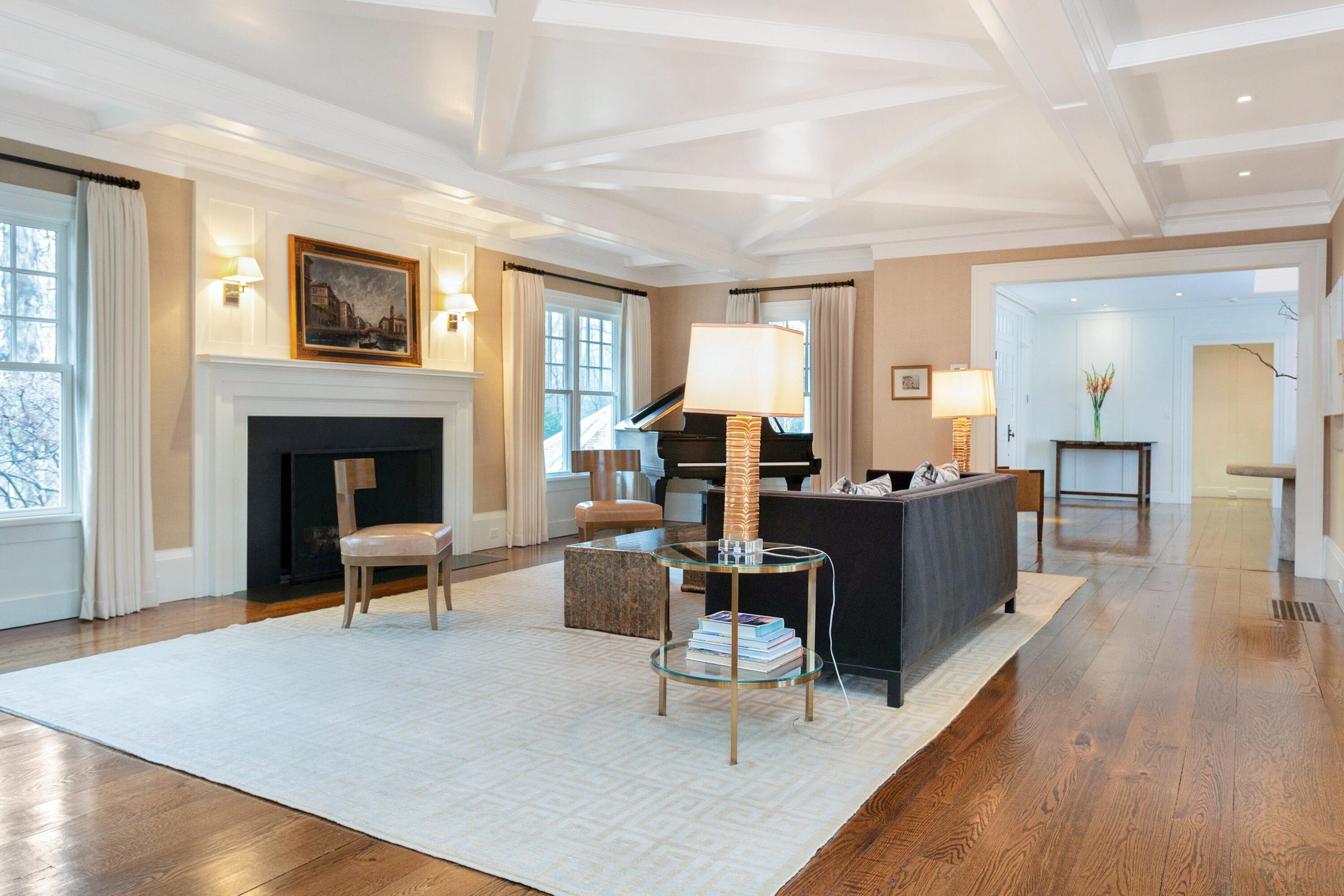 20 Driftway Lane Darien, CT 06820 - Photo 7 of 76 a living room with furniture dining table and a fireplace