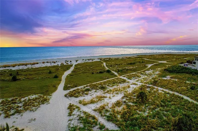 a living room with lots of furniture and a flat screen tv