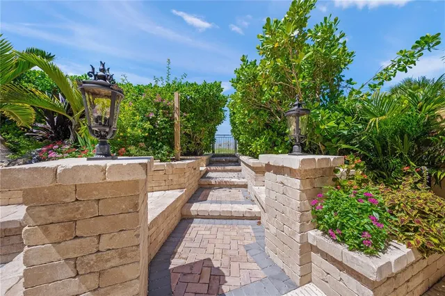 a living room with dining room and wooden floor