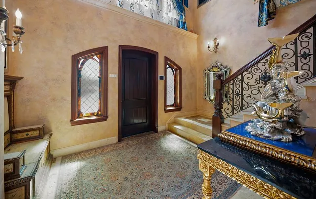 a room with furniture and a flat screen tv