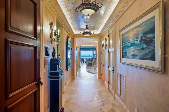 a kitchen with stainless steel appliances granite countertop a sink a stove and a wooden cabinets